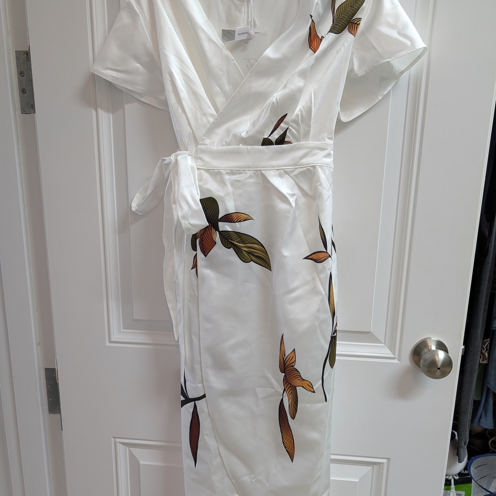 Elegant White Wrap Dress with Floral Accents